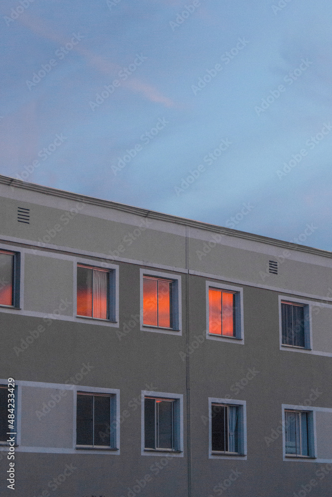 facade of a building with sunset
