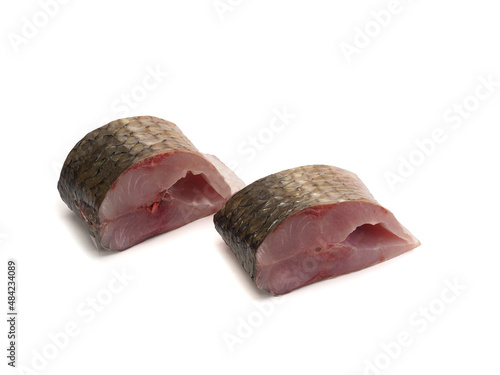 Pieces of red-finned mullet isolated on a white background