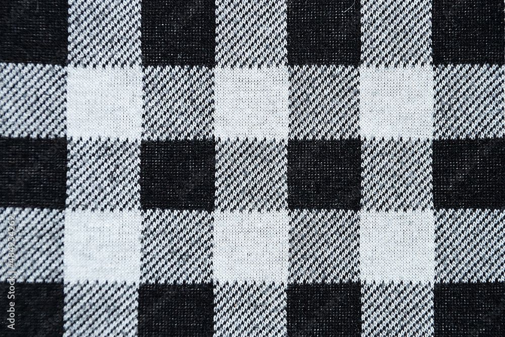 black and white checkered knitted material for monochrome textile background