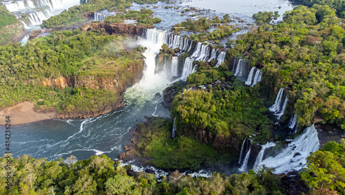Beautiful aerial view of the Iguassu Falls from a helicopter, one of the Seven Natural Wonders of the World. Foz do Iguaçu, Paraná, Brazil photo