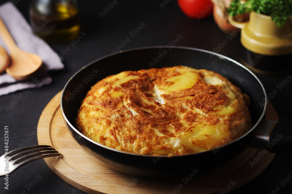Traditional Spanish dish tortilla on the table Traditional Spanish dish tortilla on the table