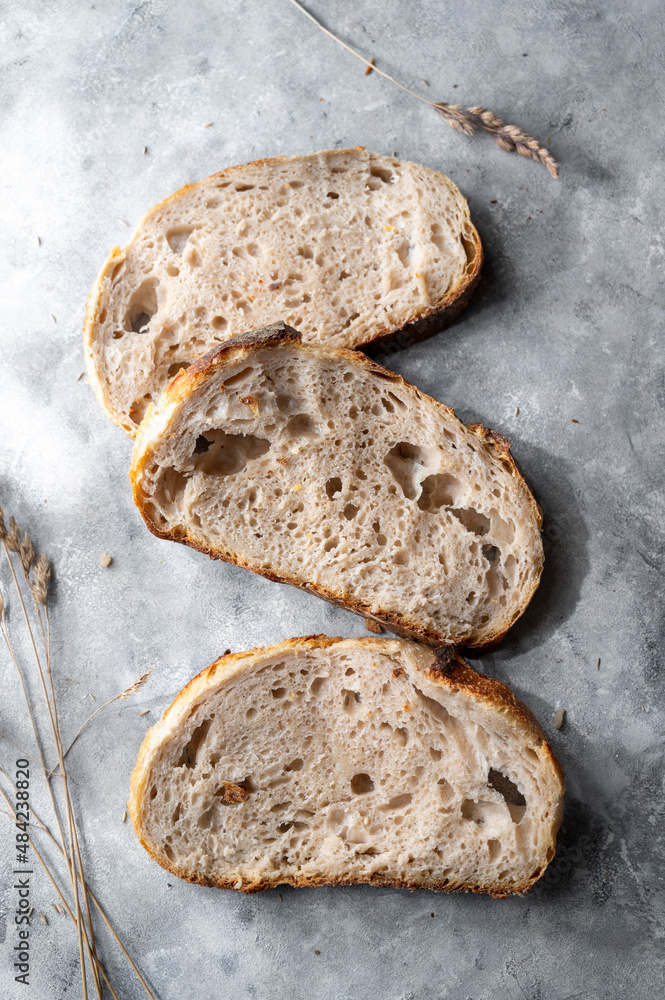 Sourdough bread slices, homemade healthy bread, top view. Sourdough bread slices, homemade healthy bread, top view.