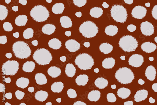Deer skin color seamless pattern. Brown background with light rounded spots.