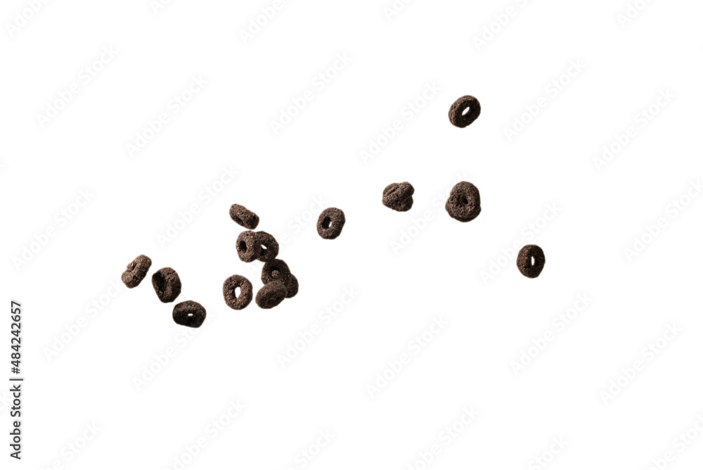 Chocolate rings cereal spill out into a bowl. Breakfast. Chocolate rings cereal spill out into a bowl. Breakfast.