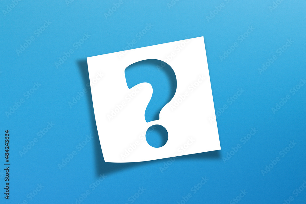 Note paper with question mark on blue background Note paper with question mark on blue background
