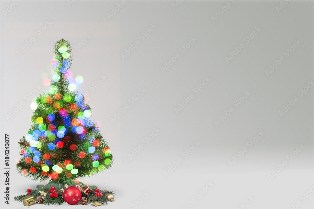 Christmas green tree and gifts on the floor, holliday concept Christmas green tree and gifts on the floor, holliday concept