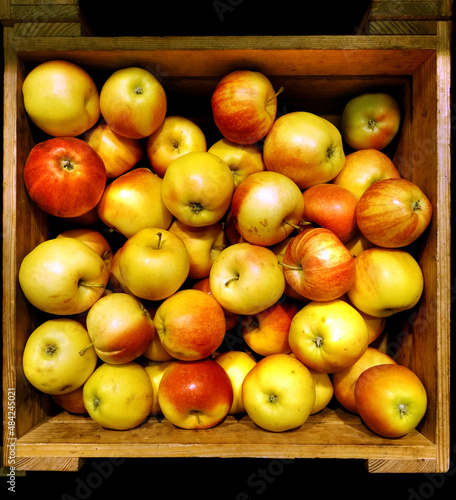 wooden box with apples