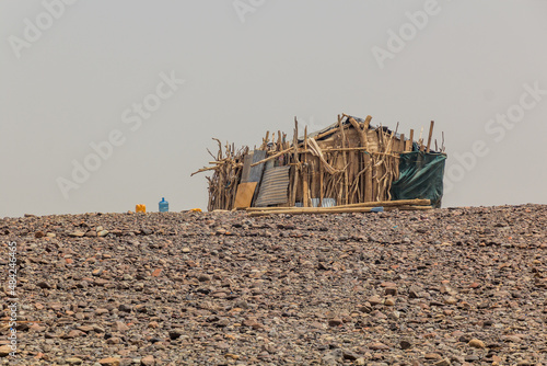 Simple hut in Hamed Ela, Afar tribe settlement in the Danakil depression, Ethiopia. photo