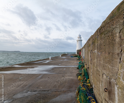 MACDUFF,ABERDEENSHIRE,SCOTLAND - 31 JANUARY 2022: This is a view looking out to sea from the entrance to the Harbour at Macduff, Aberdeenshire, Scotland on 31 January 2022. photo