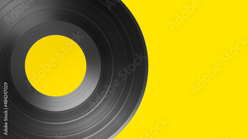 Vinyl record on yellow background with copy space. Yellow label mock up