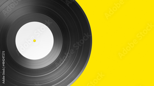 Vinyl record on yellow background with copy space. White label mock up