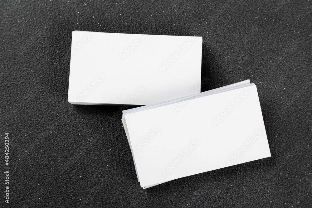 Photos of business cards. Mock-up for corporate identity on a black background. For graphic designers presentations and portfolios Photos of business cards. Mock-up for corporate identity on a black background. For graphic designers presentations and portfolios