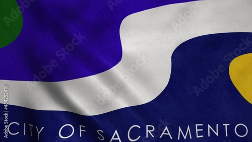 Sacramento city flag, city of USA waving in the wind photo