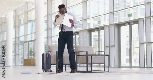 Wallpaper Mural Young African American businessman making a mess getting angry losing his cool at the office while using a laptop at work. Torontodigital.ca