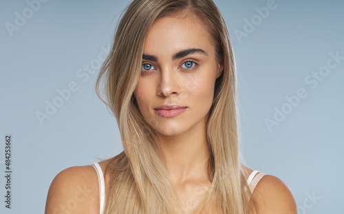 Beauty portrait of a young natural woman with fresh and clean skin