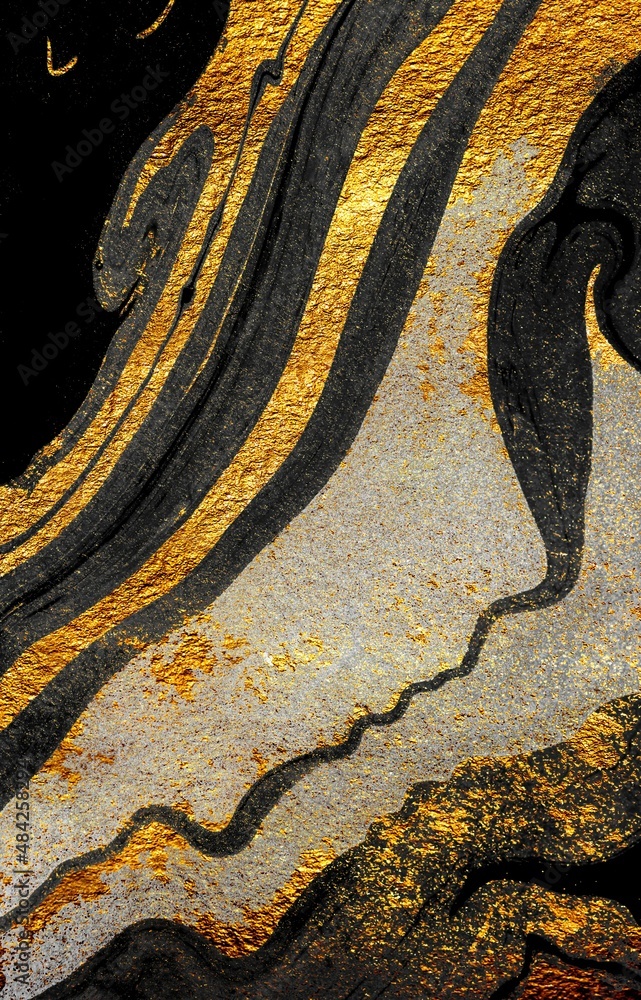 Golden swirl, artistic design. Suminagashi the ancient art of