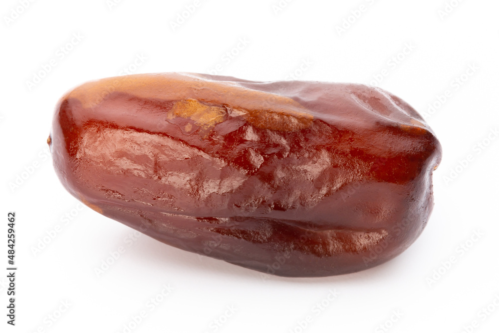 Dry dates isolated on white background. Top view. Flat lay pattern. Dry dates isolated on white background. Top view. Flat lay pattern.