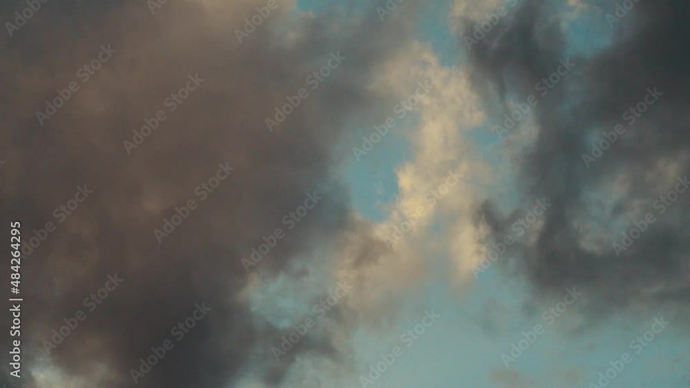 Dark clouds in the sky block the sun Dark clouds in the sky block the sun