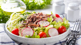 Salad with beef tongue and vegetables. Closeup