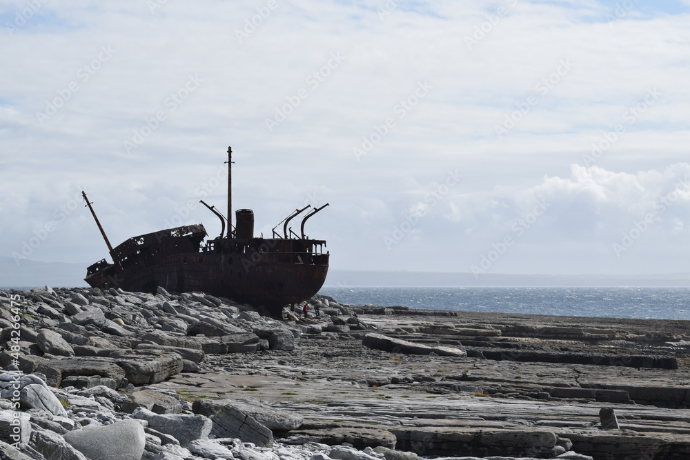 Plassey shipwreck on the beach. Ship stranded on rocks. Ship silhouette. Inisheer. Aran Island. Ireland