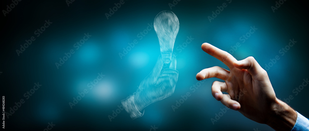 drawn hand holding a light bulb. man tapping on the screen drawn hand holding a light bulb. man tapping on the screen