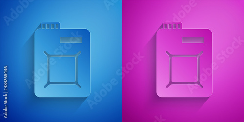 Paper cut Canister for motor machine oil icon isolated on blue and purple background. Oil gallon. Oil change service and repair. Engine oil sign. Paper art style. Vector