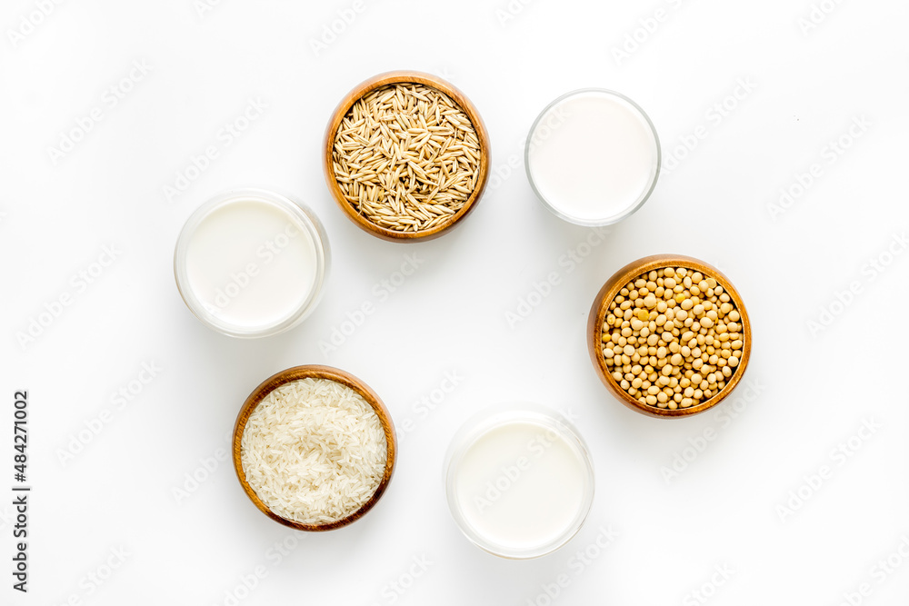 Dairy free vegan milk with nuts and cereals, top view Dairy free vegan milk with nuts and cereals, top view