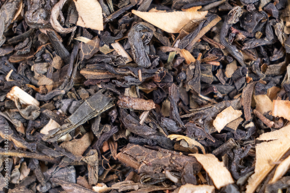 Mixture of healthy herbal Organic Dry Chai Tea full frame as background. Macro. Mixture of healthy herbal Organic Dry Chai Tea full frame as background. Macro.
