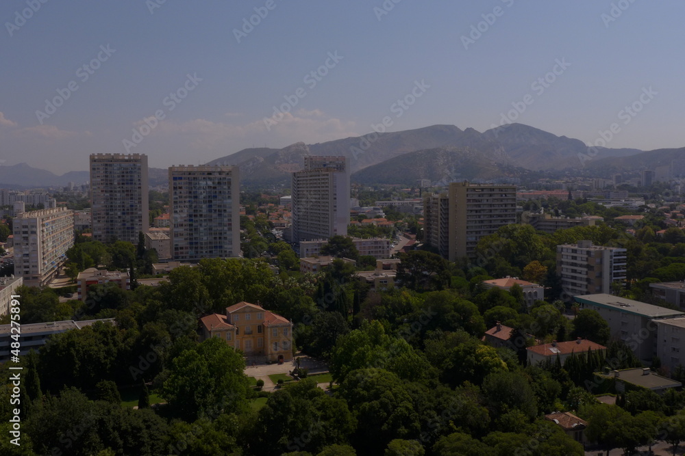 city skyline with montains and trees
