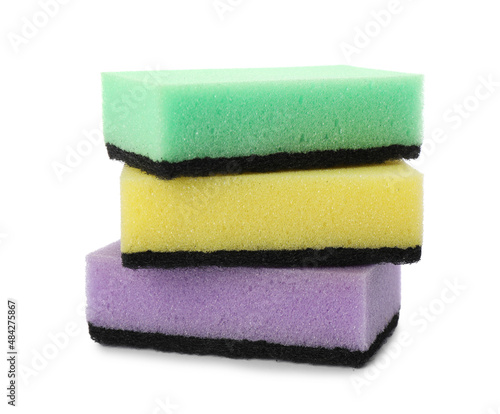 Bright cleaning sponges with abrasive scourers on white background