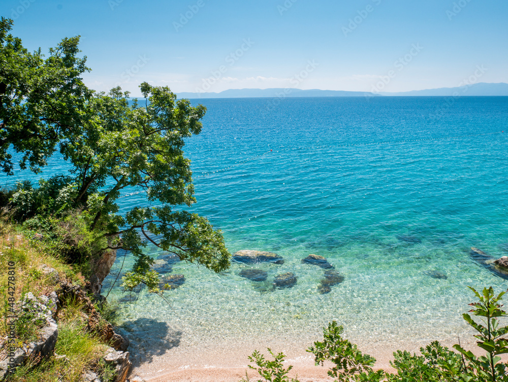 Sea, beach and green trees in Kostrena, Croatia Sea, beach and green trees in Kostrena, Croatia