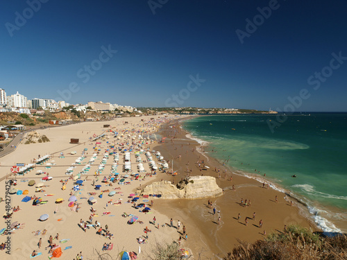 A section of the idyllic Praia de Rocha beach on the Algarve region. © wjarek