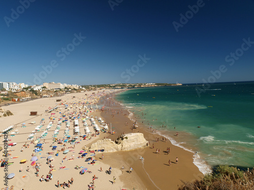 A section of the idyllic Praia de Rocha beach on the Algarve region. © wjarek