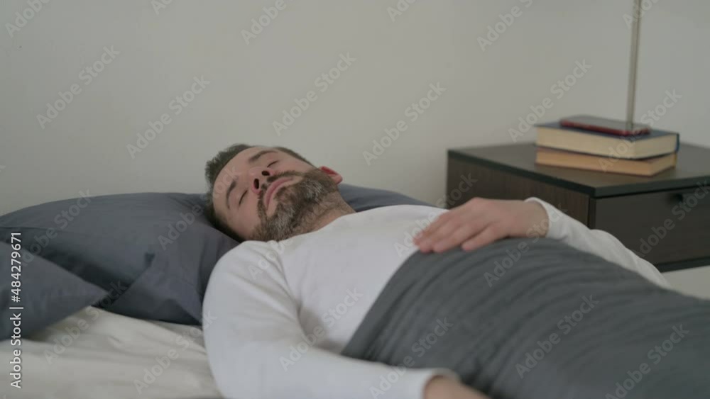 Man Sleeping in Bed Peacefully Man Sleeping in Bed Peacefully