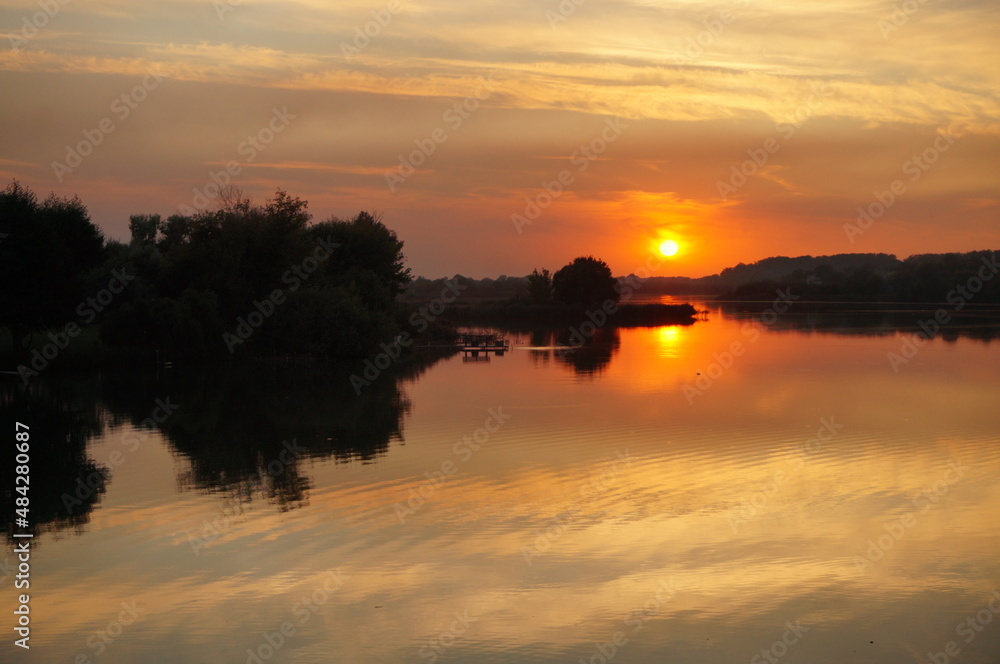 sunset over the river sunset over the river