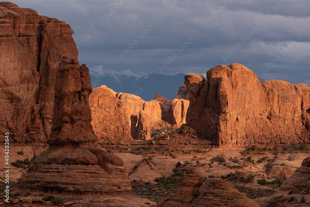 Rock formations in the desert of Utah illuminated at sunset, Arches Natioanl Park Rock formations in the desert of Utah illuminated at sunset, Arches Natioanl Park