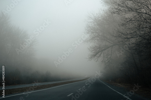 highway without cars. morning fog on the road. foggy autumn morning