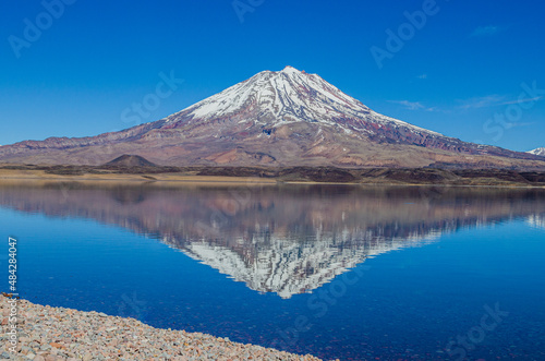 mirror lake with volcano reflection