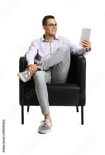 Young man using tablet comp...