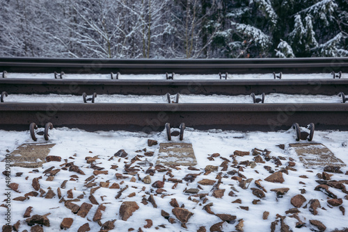 Railroad tracks during winter in Lodz Province of Poland