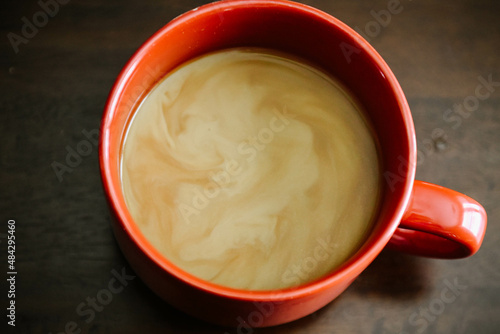 coffee with cream foam shaped as a heart