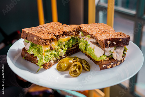 delicious chicken sandwich with plenty of avocado