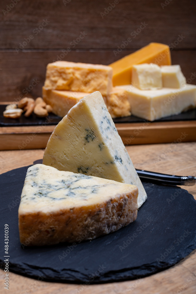 British cheeses collection, blue Stilton, Scottish coloured and English matured cheddar cheeses British cheeses collection, blue Stilton, Scottish coloured and English matured cheddar cheeses
