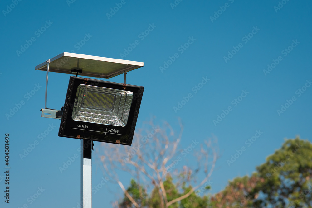 Solar cell lamp post on cloud background