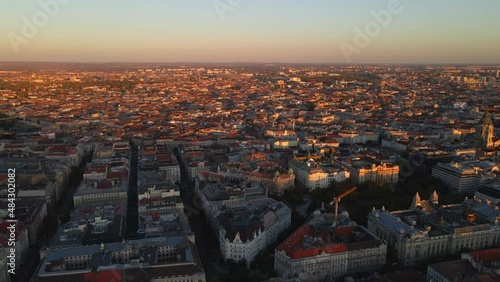 The sun sets over the Pest side of Budapest Hungary photo