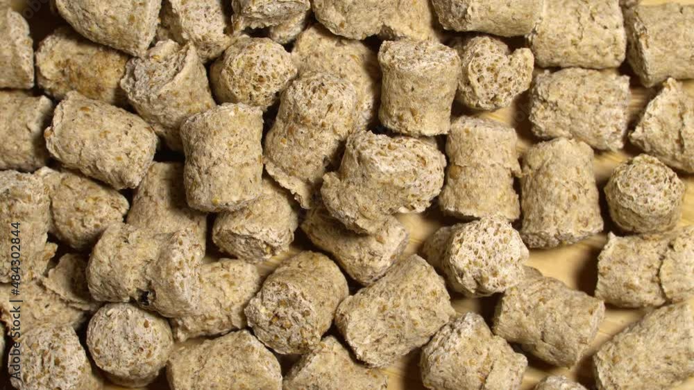 Wheat bran grains rotation background. Close up