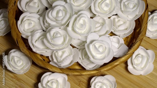 White decorative roses, rotation background. Close up