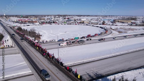 Freedom Rally 2022 drives past supporters protesting the vaccine mandates in Casselman, Ontario on their way to Ottawa. photo