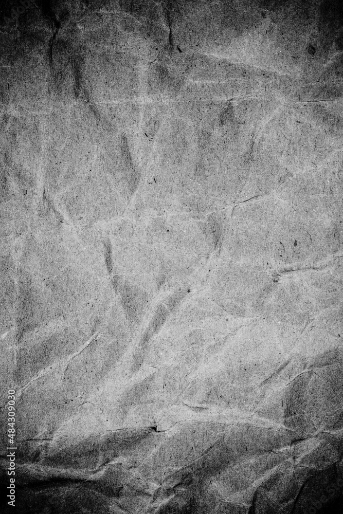 Naklejka premium Black paper crumpled texture.