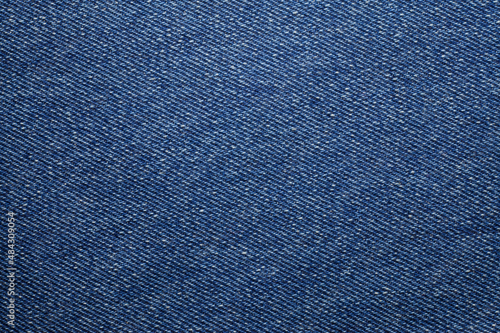 Blue torn denim jeans texture. Blue torn denim jeans texture.